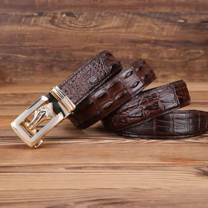 Ravil Belt set featuring brown crocodile-patterned leather belt with silver and gold buckles