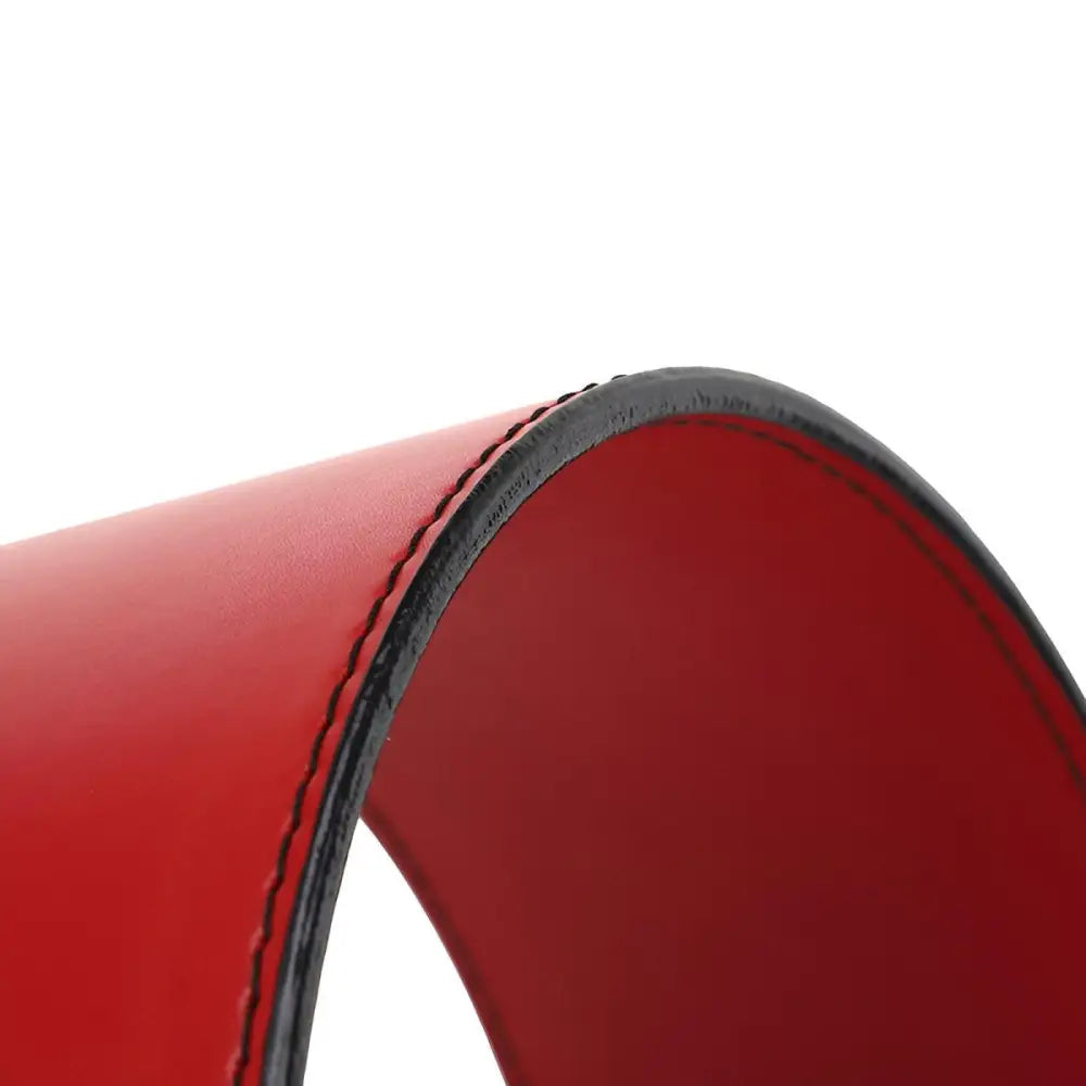 Curved red leather strap with black stitching from Black and Red Leather Double Prong Strength Belt