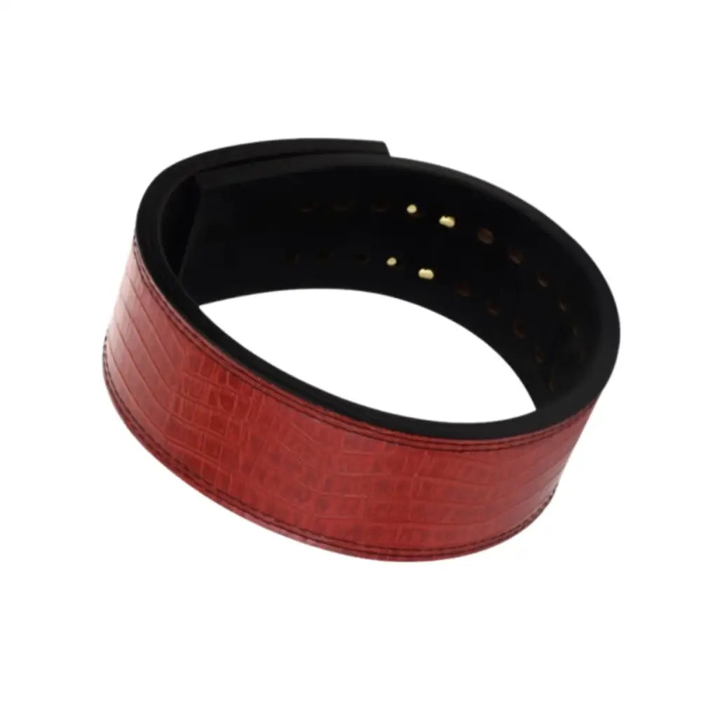 Red crocodile-patterned leather powerlifting belt with gold buckle for weightlifting and training