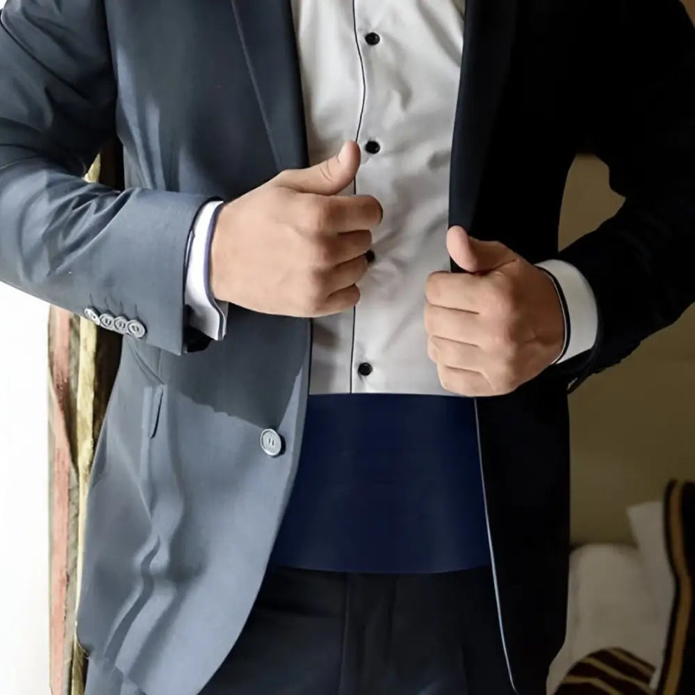 Man in formal wear showcasing Black Pleated Cummerbund for Charles Model Tuxedo Belt Accessories