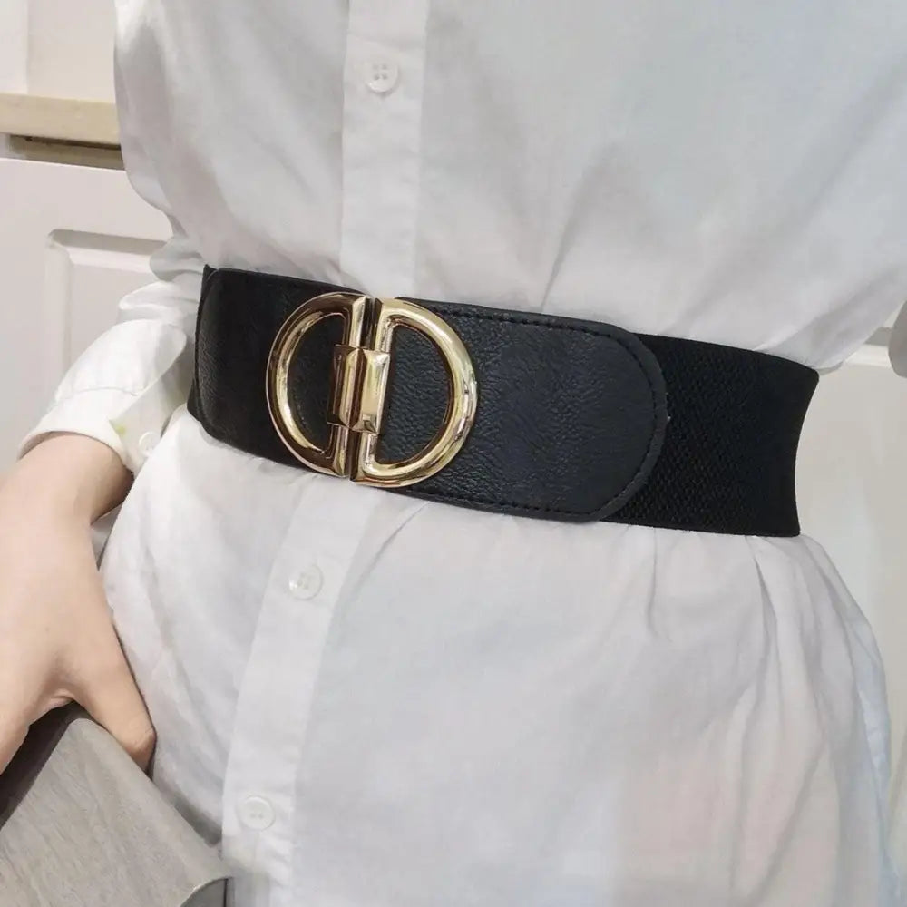 Black elastic belt with gold buckle featured in a set of four colorful belts