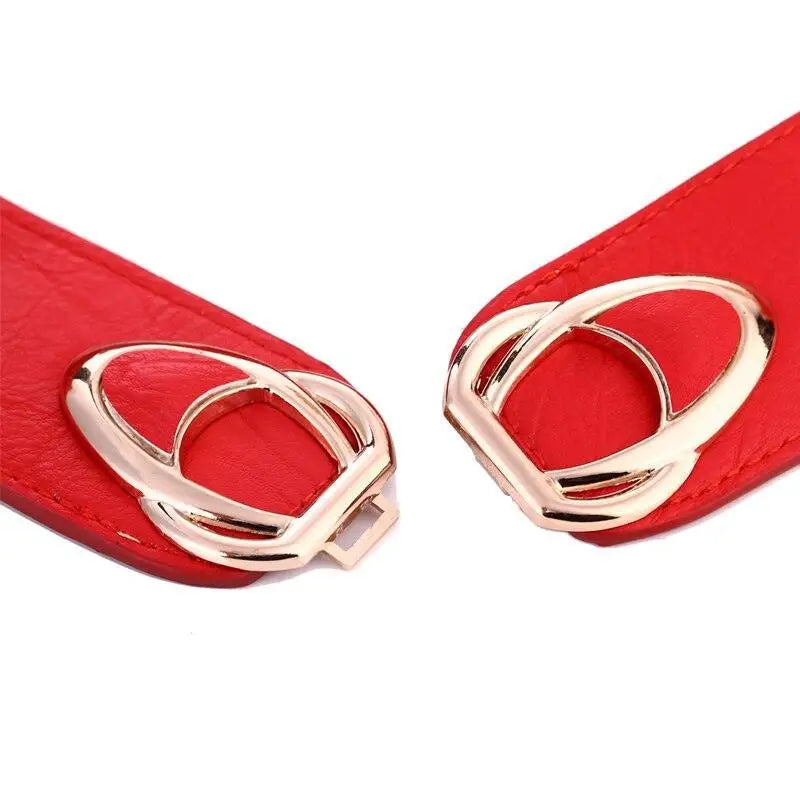 Red belt with gold heart-shaped buckle featured on Joséfine belt in Leopard Print Shirt Dress