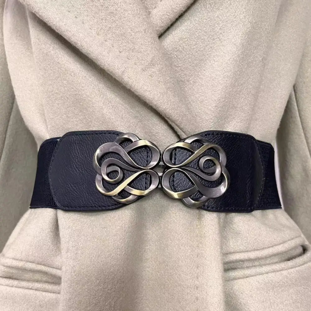 Black Natasja elastic belt with ornate metal clasp from the Natasja Elastic Belt Collection