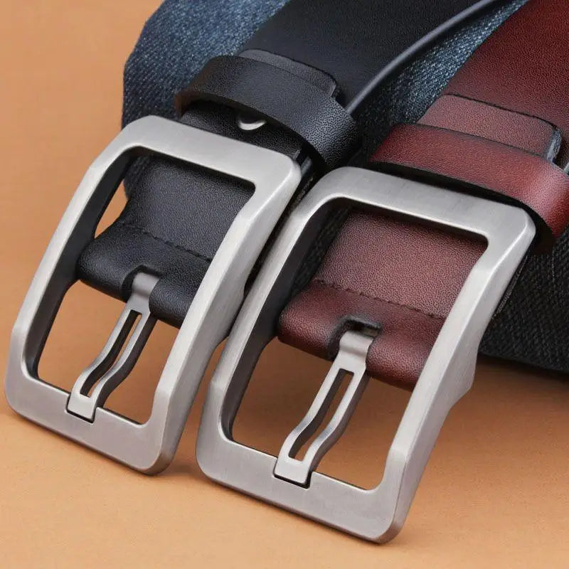 Leather belts with silver buckles in Burgundy and Brown displayed for sale