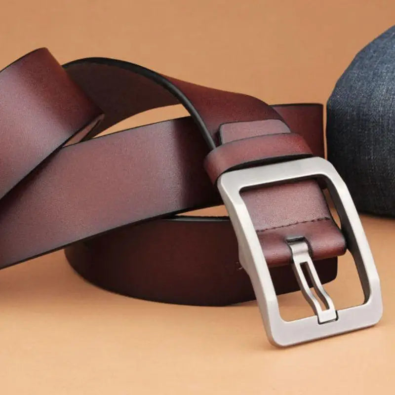Maroon leather belt with silver buckle from Leather Belts with Silver Buckles in Burgundy and Brown