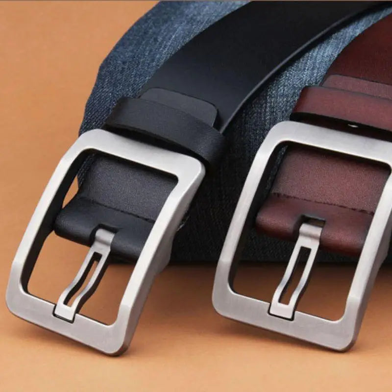 Two leather belts with silver buckles in Burgundy and Brown displayed for sale
