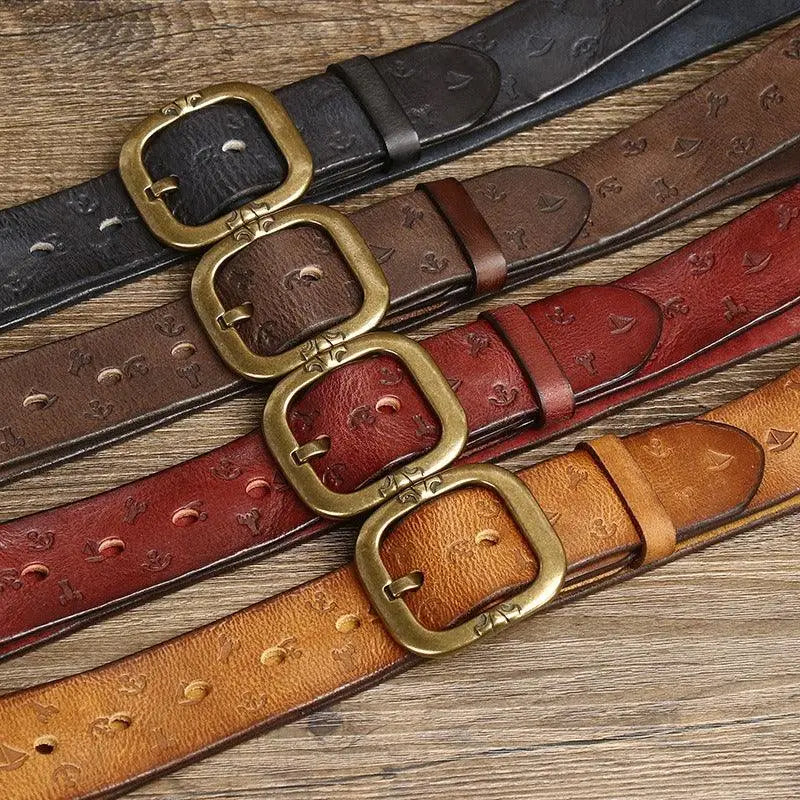 Four leather belts with brass buckles showcasing the Embossed Brown Leather Belt with Brass Buckle