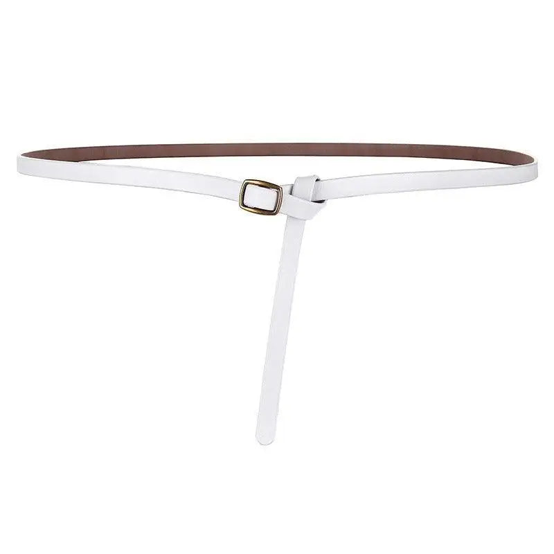 White leather belt with brass buckle displayed with Beige Halter Dress featuring a Brown Belt and Gold Buckle