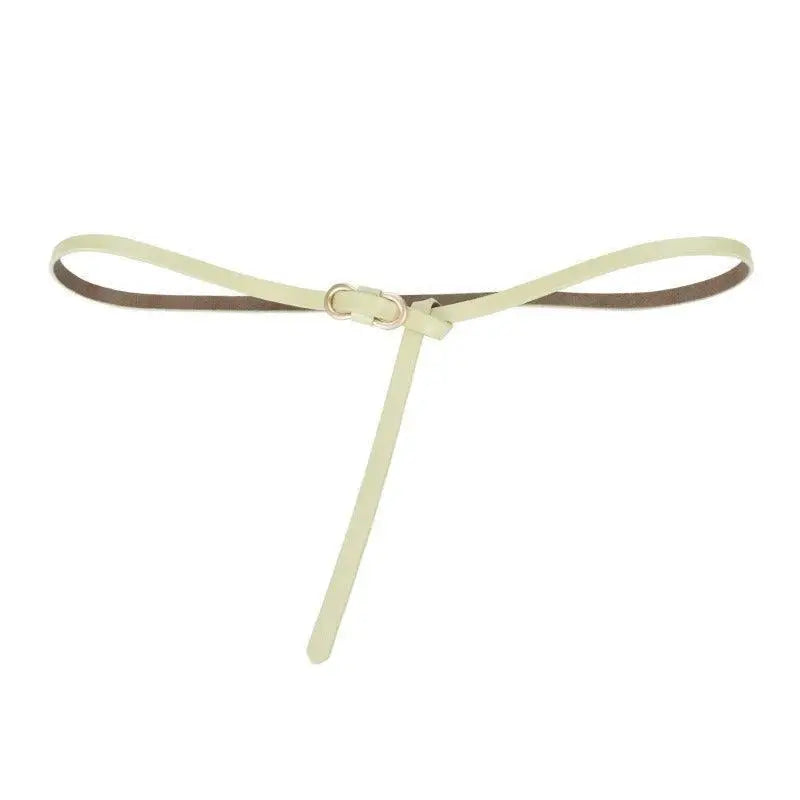 Thin light-colored leather belt with gold buckle for formal and casual wear