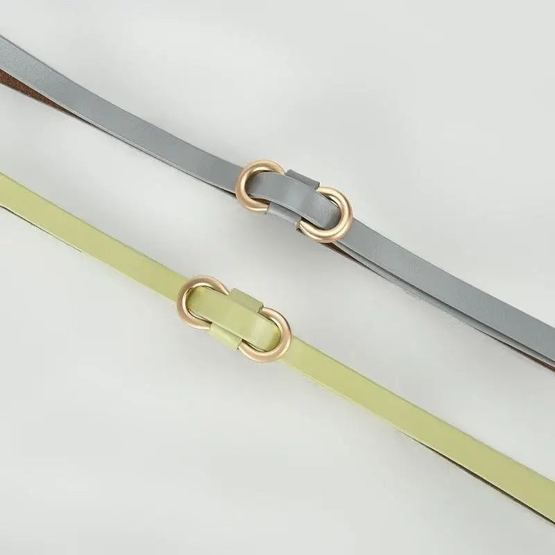 Leather belt with gold buckle displayed on a blue leather strap for formal and casual wear