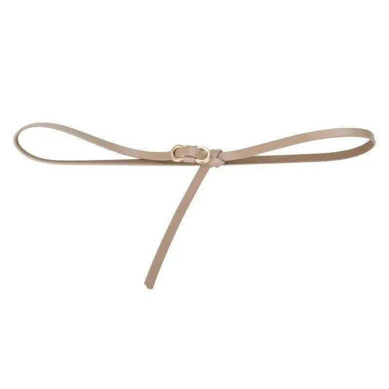 Thin beige leather belt with a gold buckle for formal and casual wear