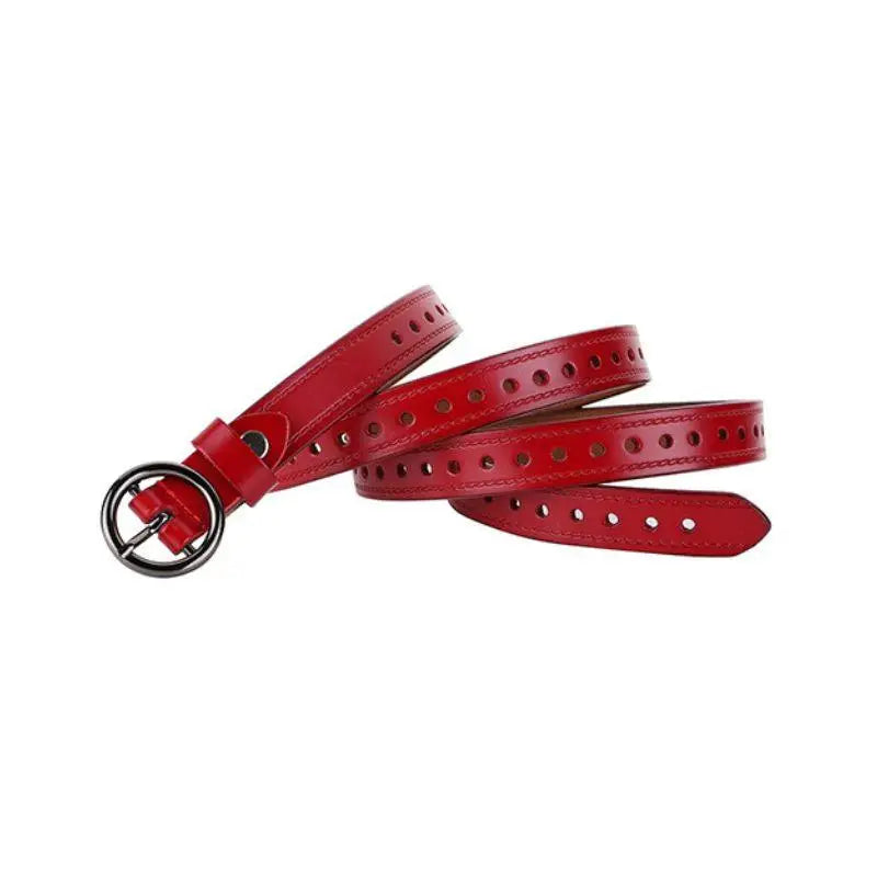 Red leather belt with circular buckle and perforated holes from Red Leather Belt and White Cardigan with Red and Blue Trim