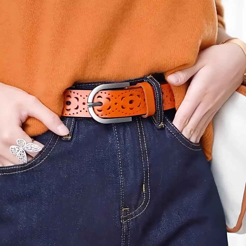 Orange leather belt with floral cutouts from Eteri Leather in stylish Olive Green Blazer outfit