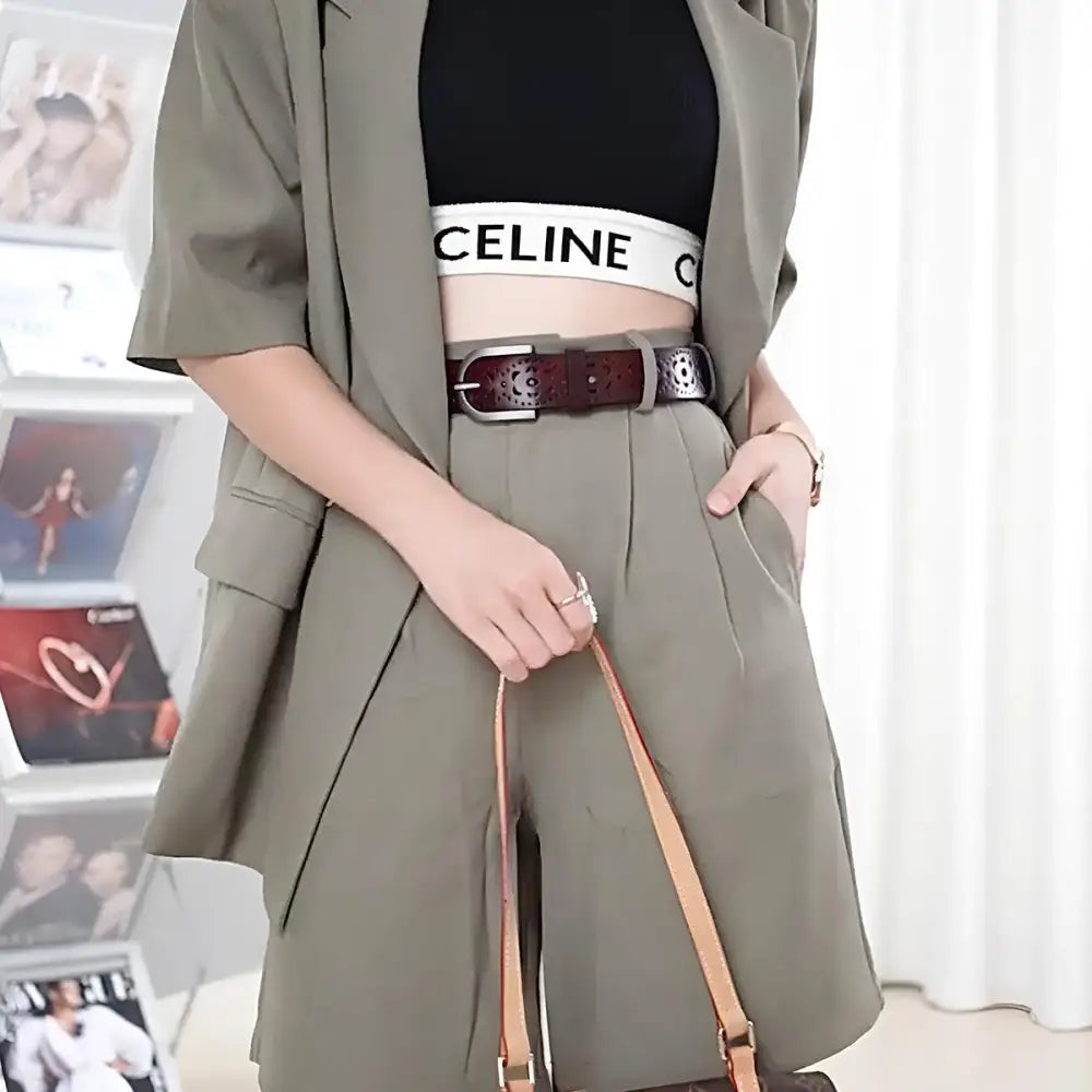 Olive green blazer and shorts outfit featuring high-quality Eteri leather belt