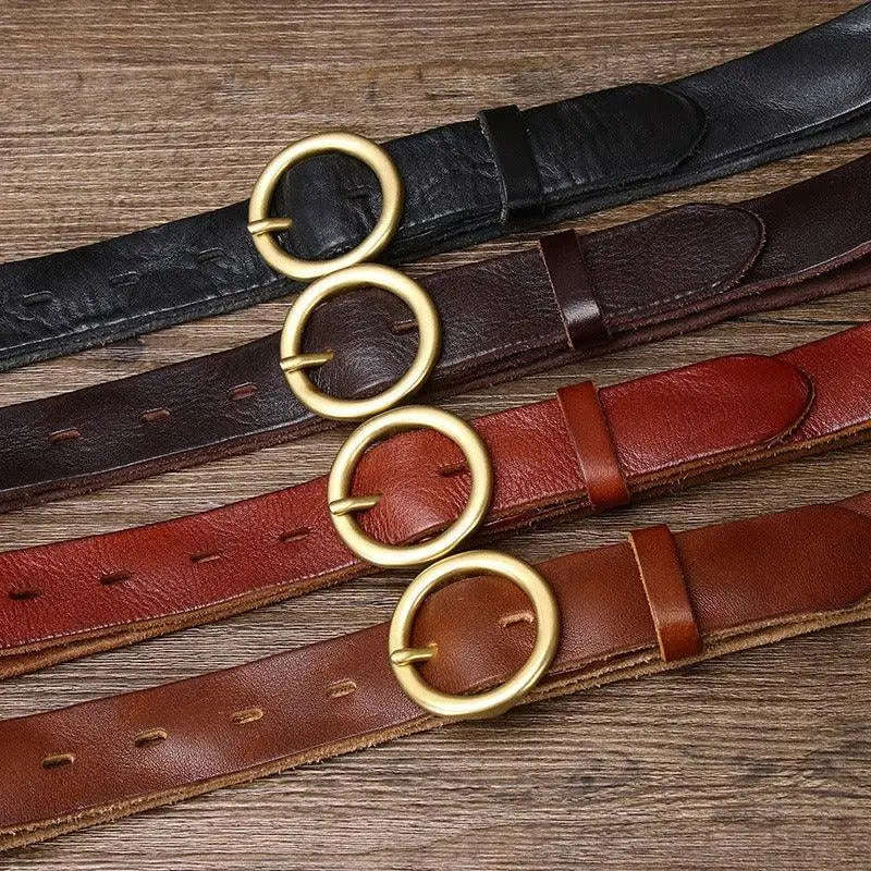 Leather belts featuring brass and gold buckles for a sophisticated accessory