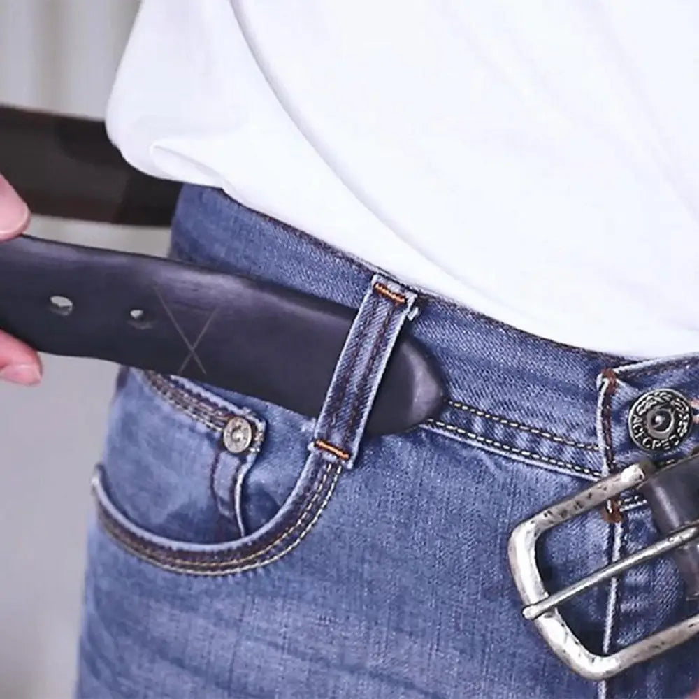 Blue jeans with a black leather belt featuring a silver buckle for elegant style