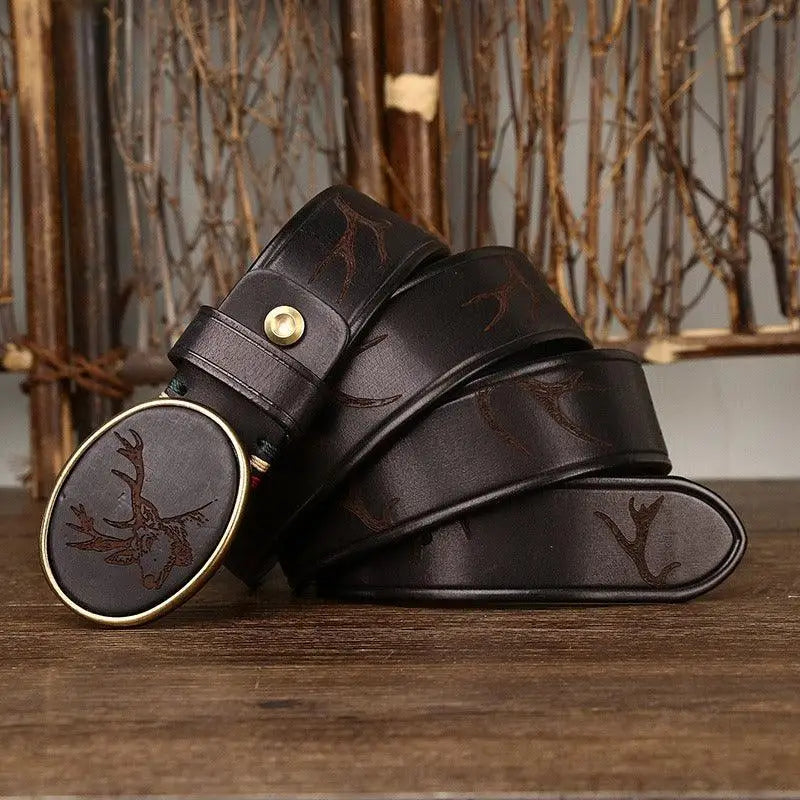 Brown leather belt featuring a detailed deer buckle design