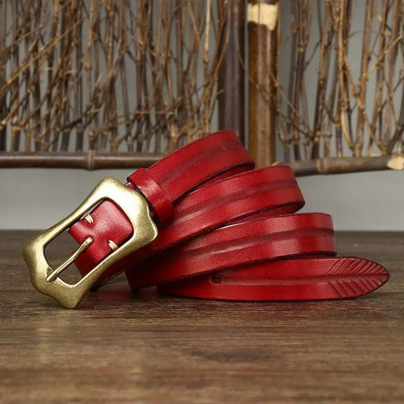 Red leather belt with brass buckle from Radhika Leather Belt collection for stylish wear