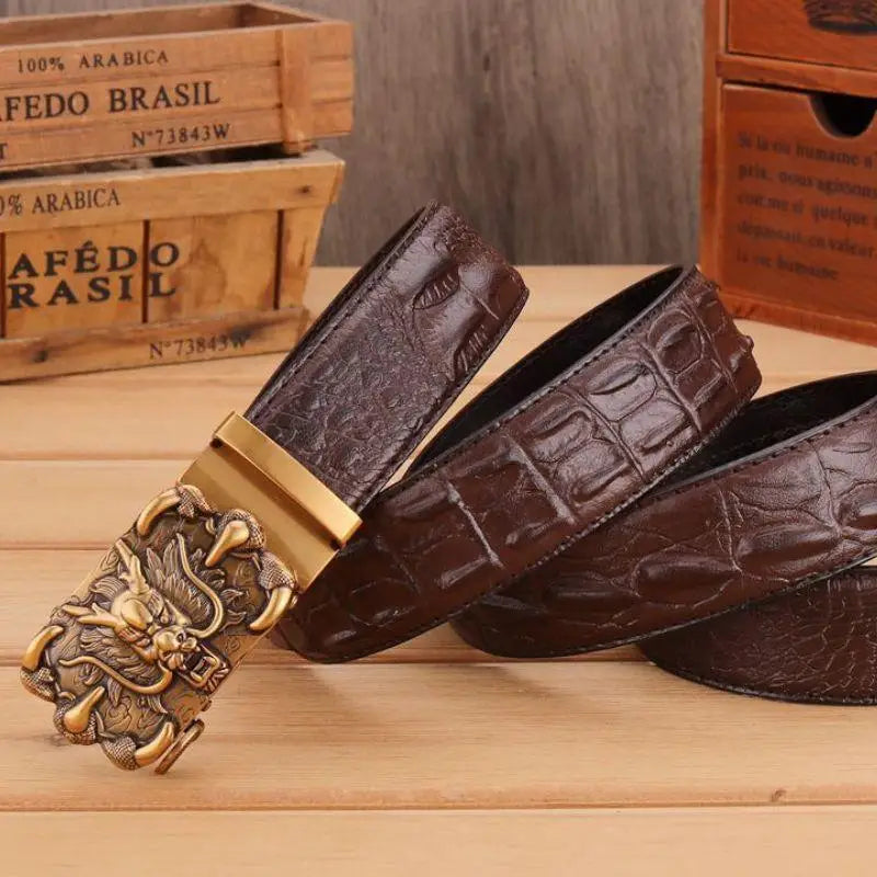 Brown crocodile leather belt featuring a detailed dragon buckle for stylish wear