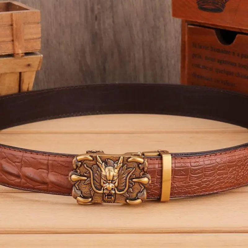 Brown crocodile leather belt with a detailed dragon buckle for a stylish accessory