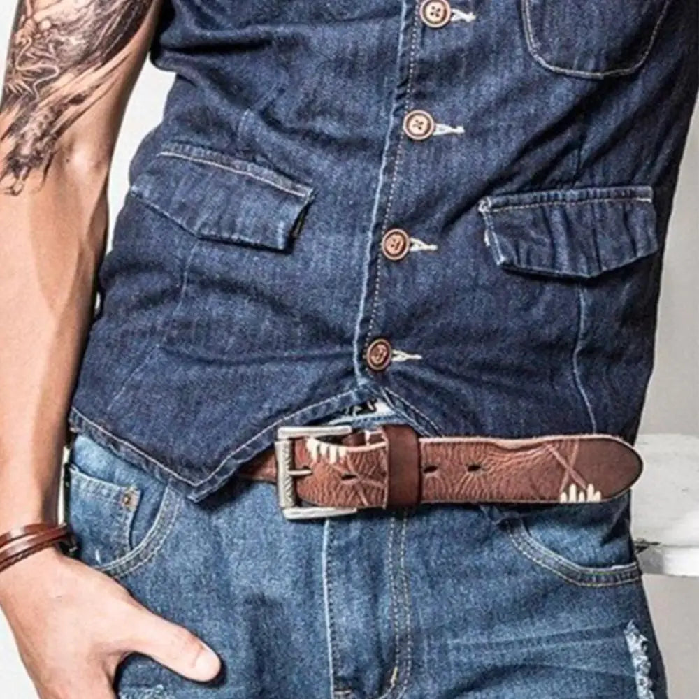 Denim vest paired with a brown leather belt featuring a silver buckle for style and durability