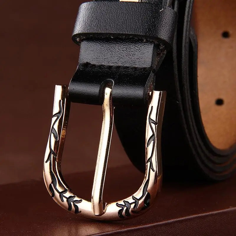 Black leather belt with an ornate gold buckle from Leather Belts with Decorative Buckles in Various Colors