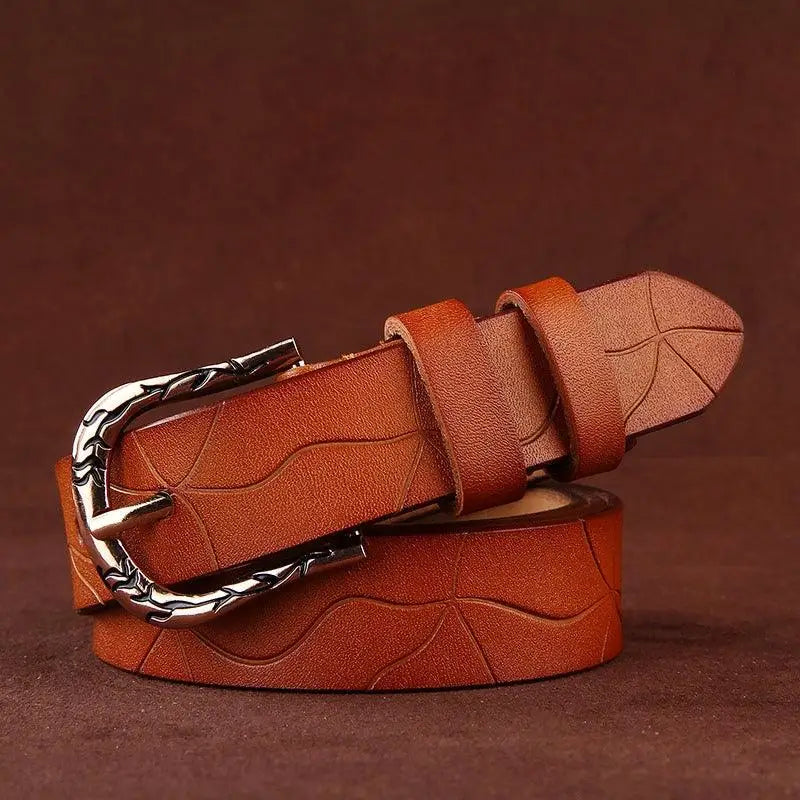 Brown leather belt with a silver decorative buckle from Leather Belts with Decorative Buckles in Various Colors
