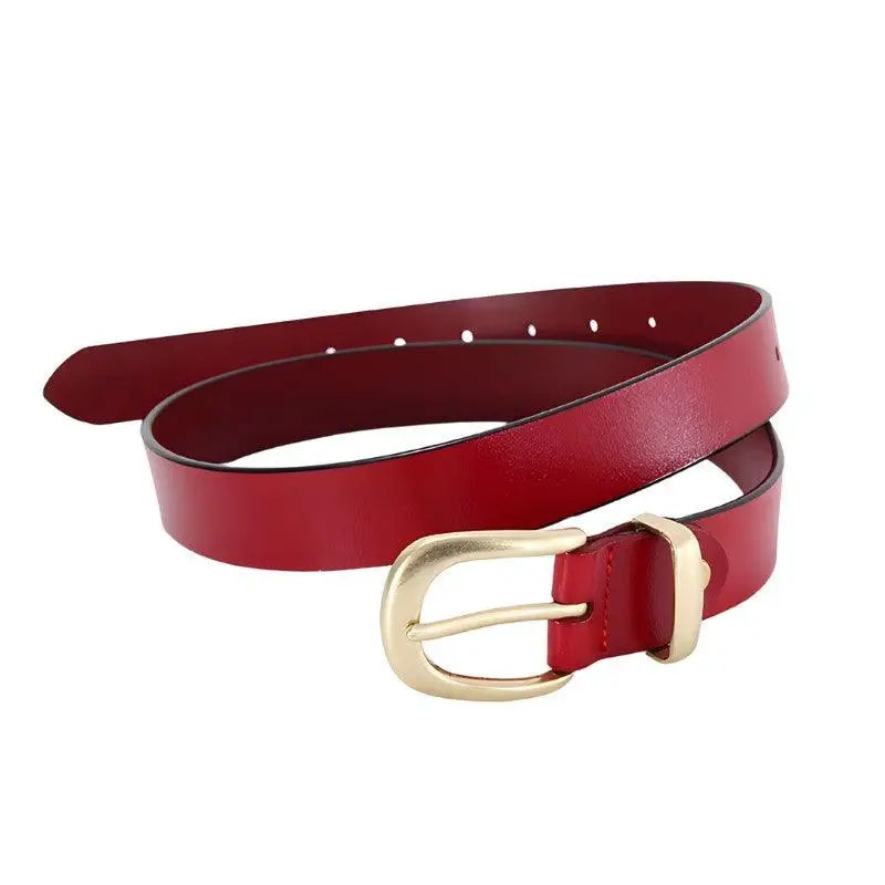 Red leather belt with a gold buckle featured in Distressed Blue Jeans with Golden Buckle Leather Belts