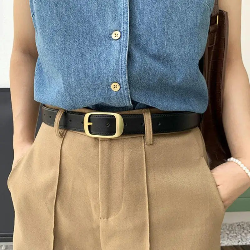 Elegant leather belt for women with a stylish gold buckle for a sophisticated look