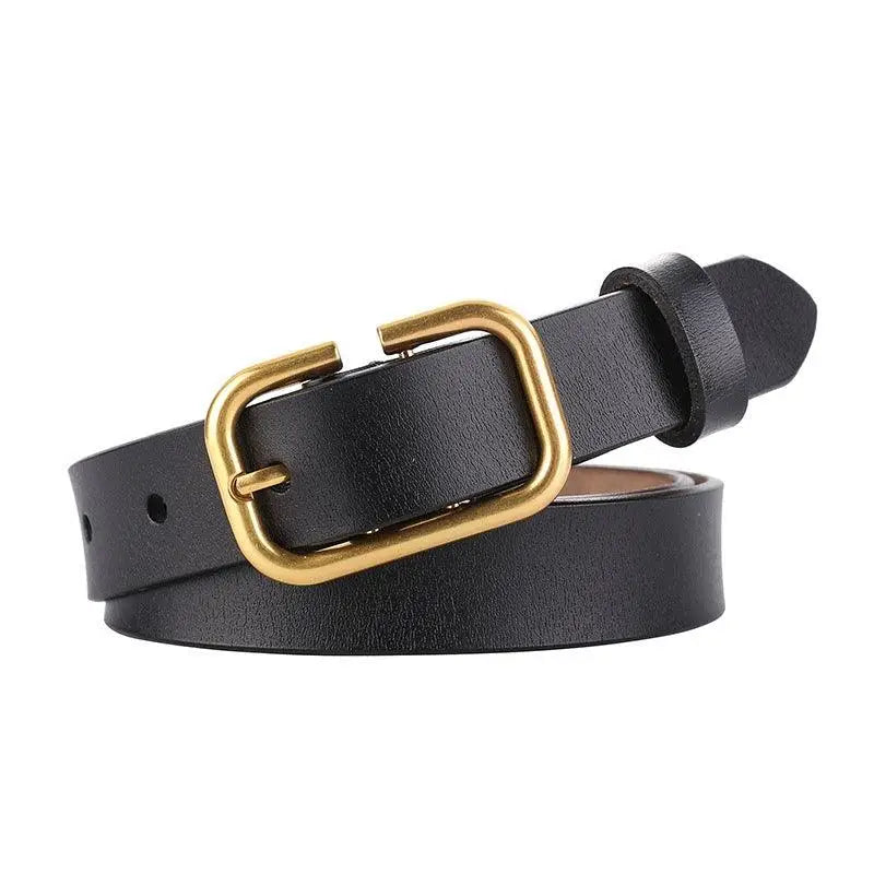 Set of three black leather belts with gold buckles arranged for display