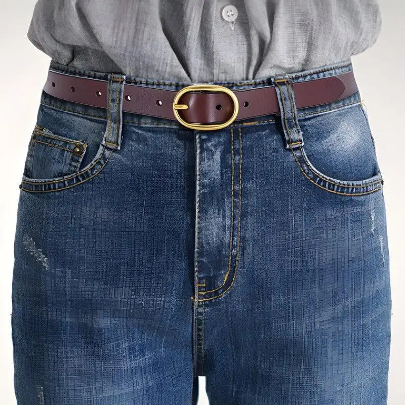 Blue jeans paired with Fiona Women’s Belt in Burgundy Leather with Gold Oval Buckle