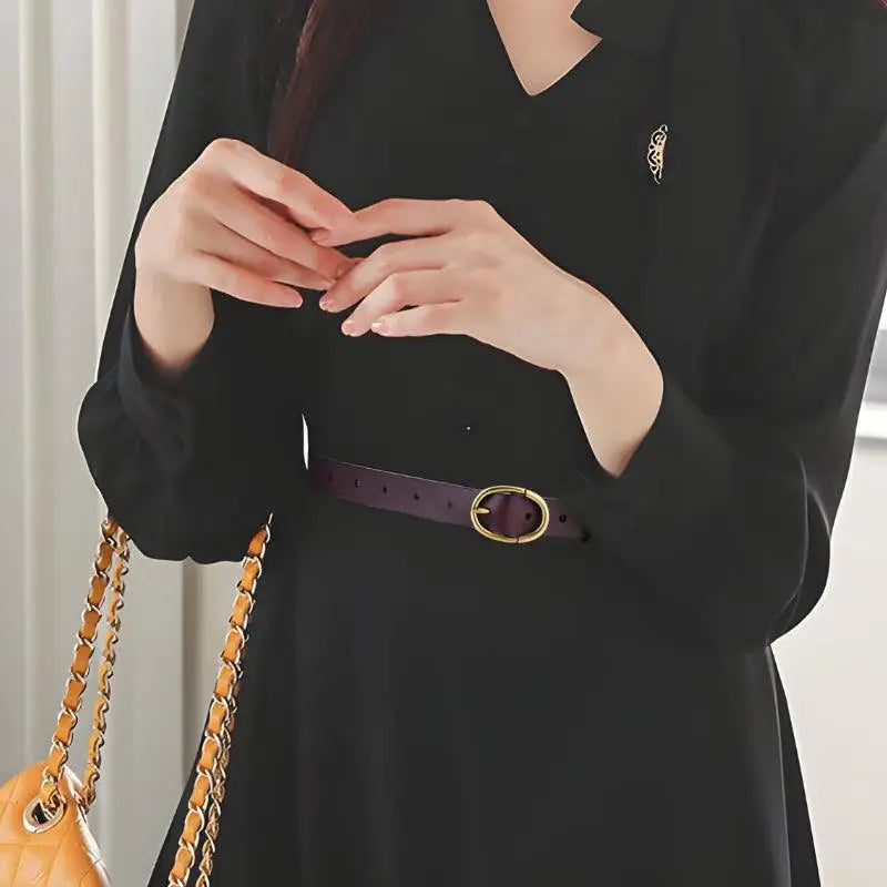 Black dress with a purple belt from Elegant Dresses and Belts in Black Burgundy and Brown tones