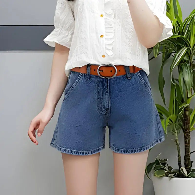 Denim shorts with brown leather belt and silver buckle for women product display