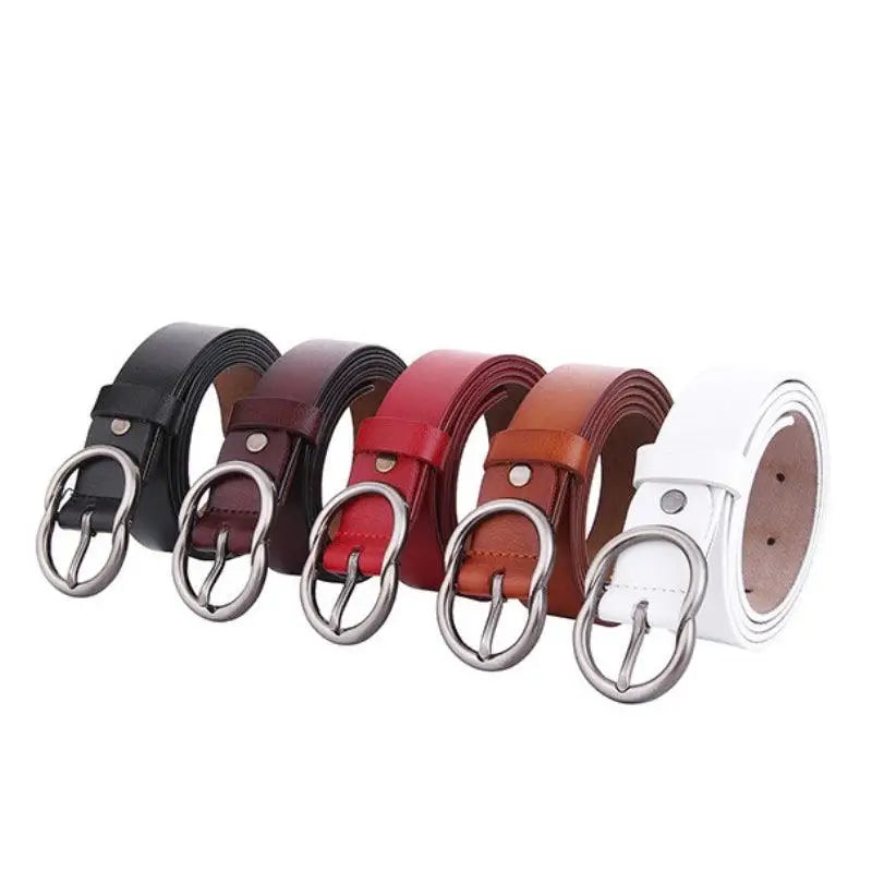 Assorted brown leather belts with silver buckles displayed with a Brown Leather Belt for Women