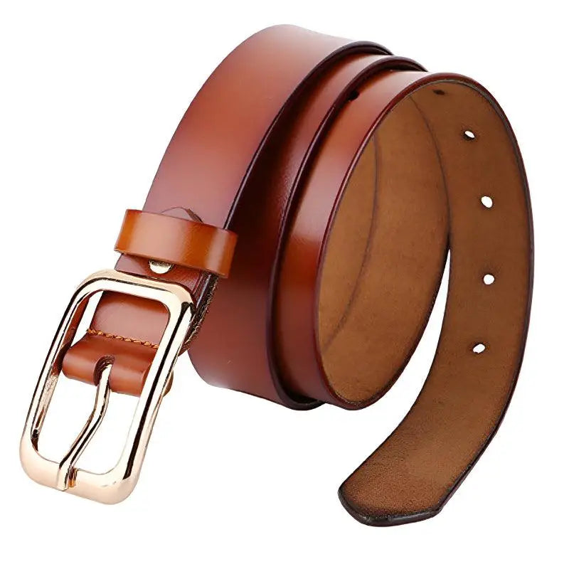 Brown leather belt with gold buckle from Women’s Outfit Featuring White Sweater Blue Jeans and Gold Buckle Belts