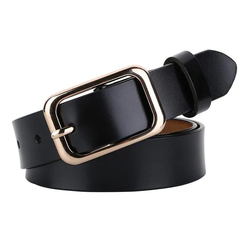 Black leather belt with gold buckle from Women’s Outfit Featuring White Sweater Blue Jeans and Gold Buckle Belts