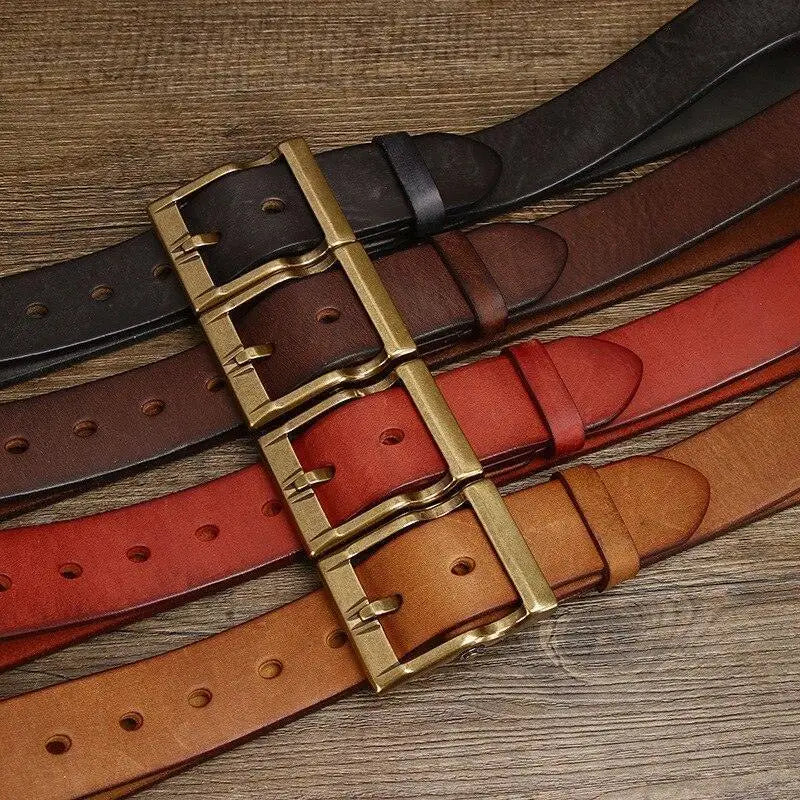 Assorted grain leather belts with brass and gold buckles for stylish accessories