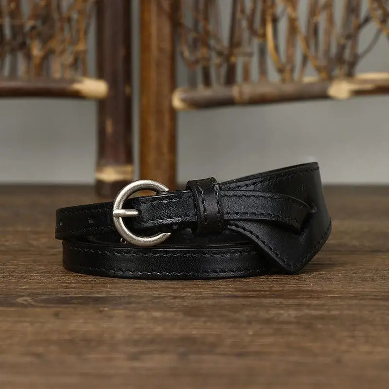 Black leather belt with a silver buckle from Priya Belt Collection of Leather Belts