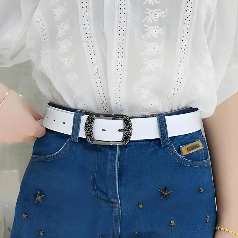 White belt featuring an ornate buckle from Ornate Buckle Belts collection in leather options