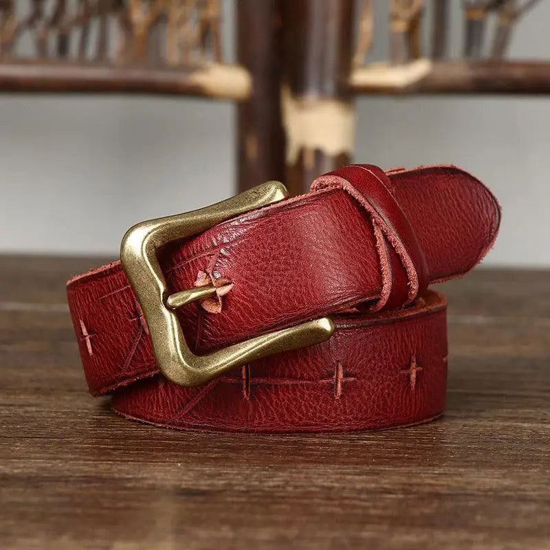 Red leather belt with a brass buckle for stylish and durable accessory use