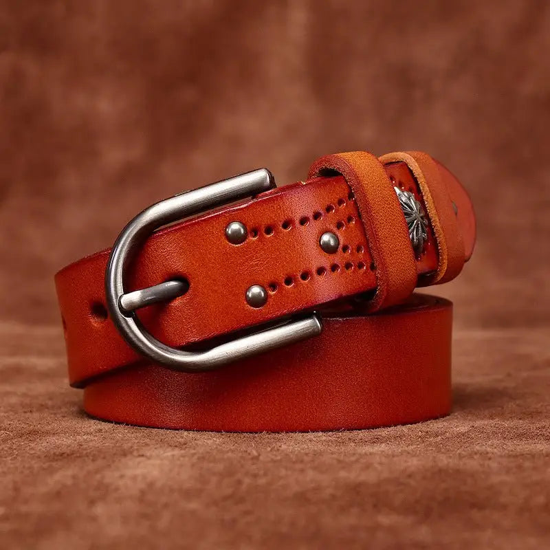 Orange leather belt with silver buckle from Colorful Leather Belts with Decorative Buckles for Stylish Accessories