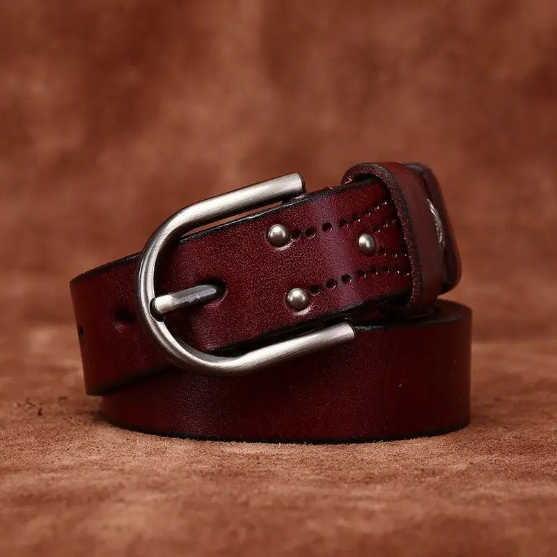 Burgundy leather belt with decorative silver buckle for stylish accessories
