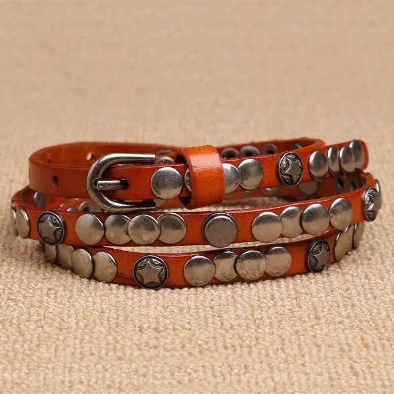 Orange leather belt with silver studs from Alpui Women’s Leather Belt Collection