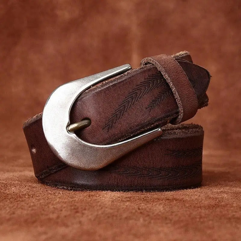 Set of three brown leather belts with silver buckles displayed for stylish wear