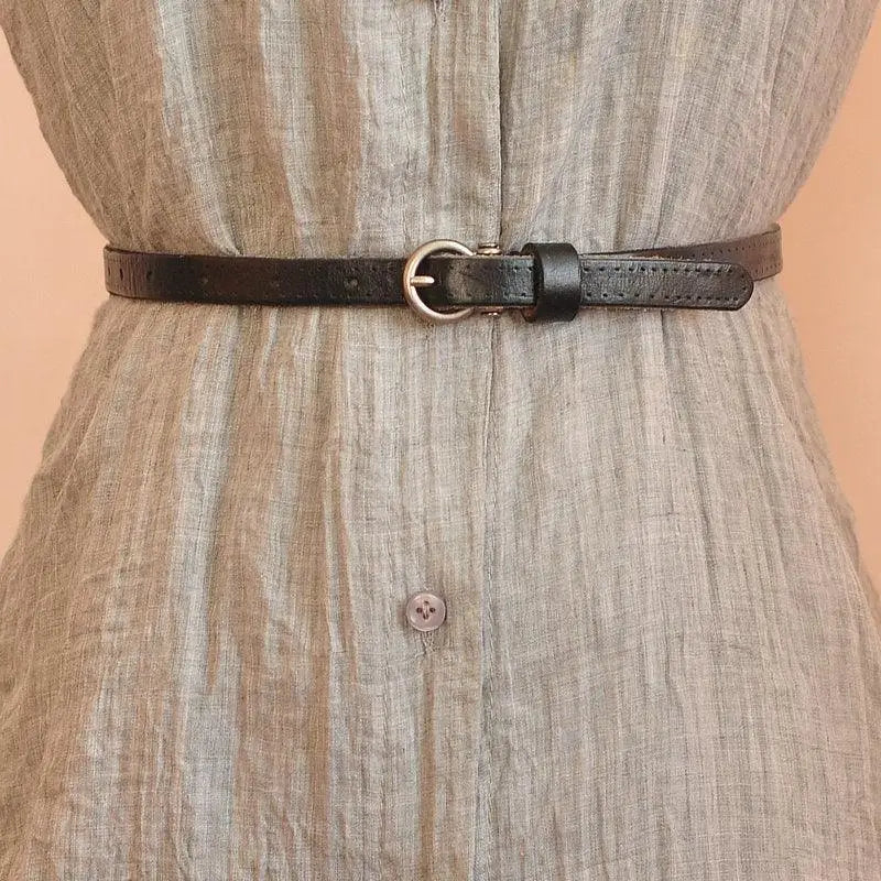 Gray dress featuring a stylish black leather belt from the Colorful Leather Belts Set