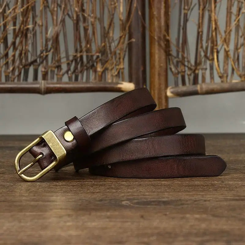 Set of four full-grain leather belts with brass buckles for stylish accessories