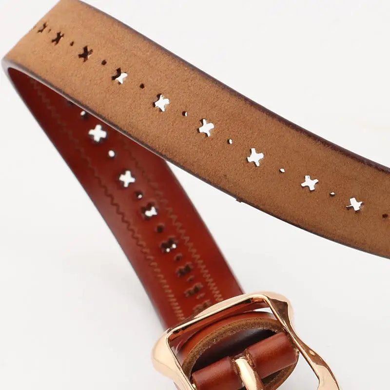 Brown leather belt with decorative perforations from Leather Belts in Various Colors with Elegant Buckle Designs