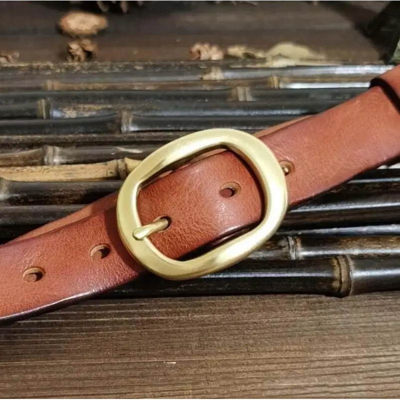 Brown leather belt with brass buckle for a classic style accessory