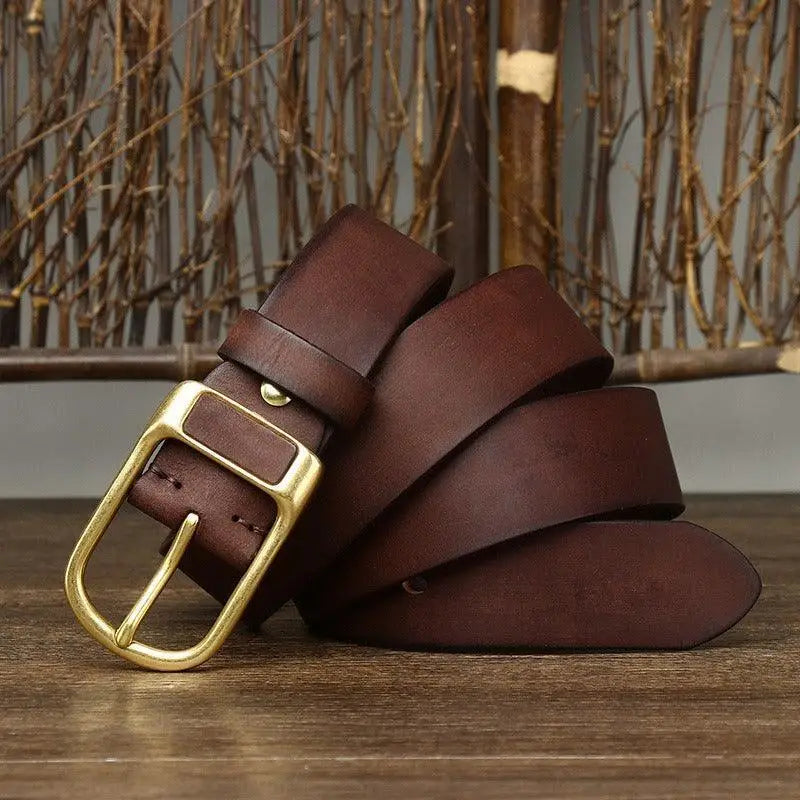 Leather belt with gold buckle displayed for men’s fashion and accessory details