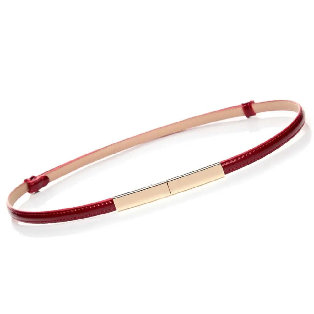 Red patent leather belt with gold buckle from Stacked Patent Leather Belts collection